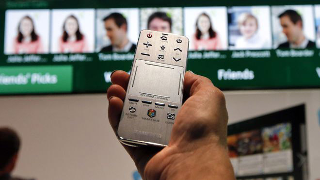 Samsung Smart Remote with TV in a background